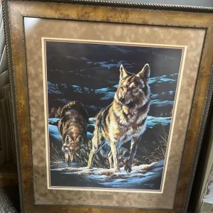 framed painting of 2 wolves